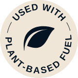 Circular badge with a leaf icon in the center and the wordsUsed with Plant-Based Fuel" around the edge.