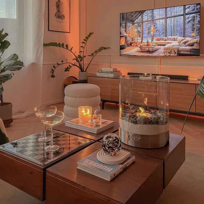 Stylish living room with ethanol indoor fireplace and cozy modern decor