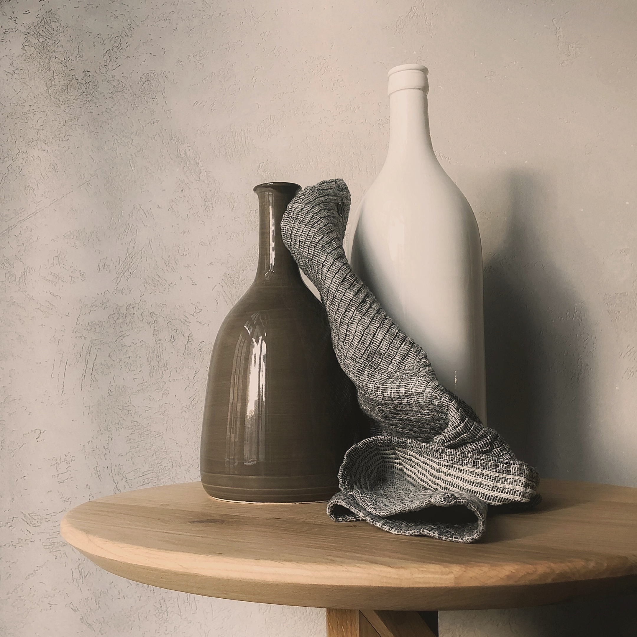 Minimalist Valentine's Day gift with ceramic vases and cozy knit scarf