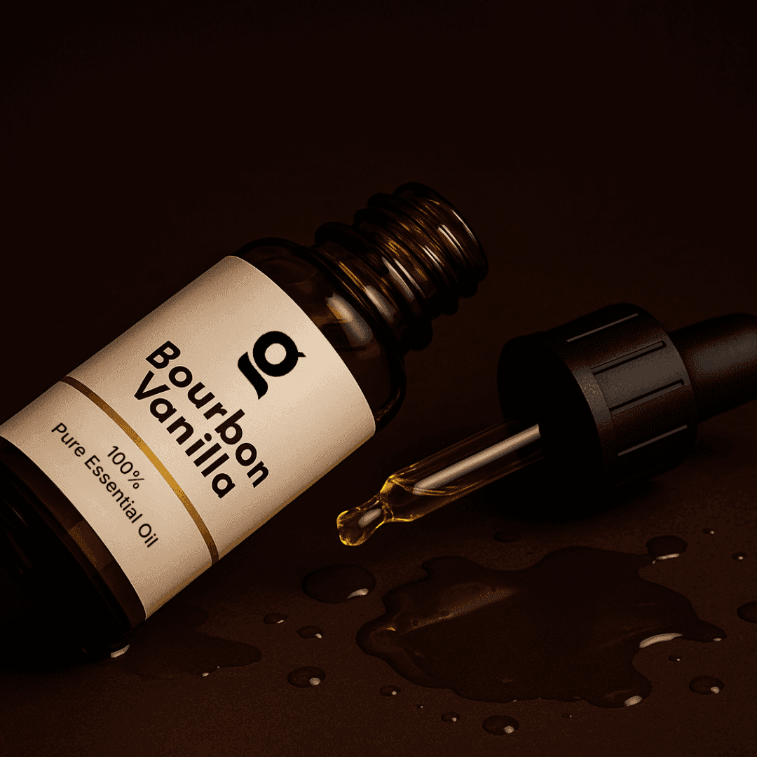 Fragrance Collection (3x) Bourbon Vanilla essential oil bottle with dropper and spilled oil, emphasizing purity and quality.