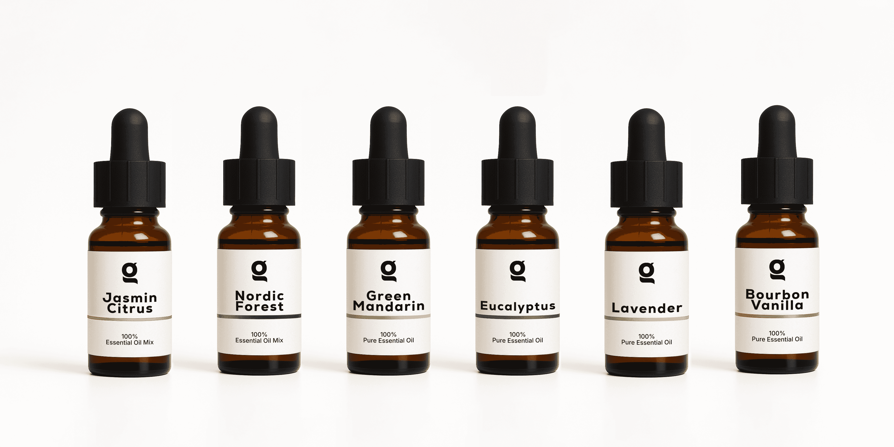 Ritual Set of 6 essential oils including Jasmine Citrus, Nordic Forest, Green Mandarin, Eucalyptus, Lavender, and Bourbon Vanilla in amber dropper bottles.