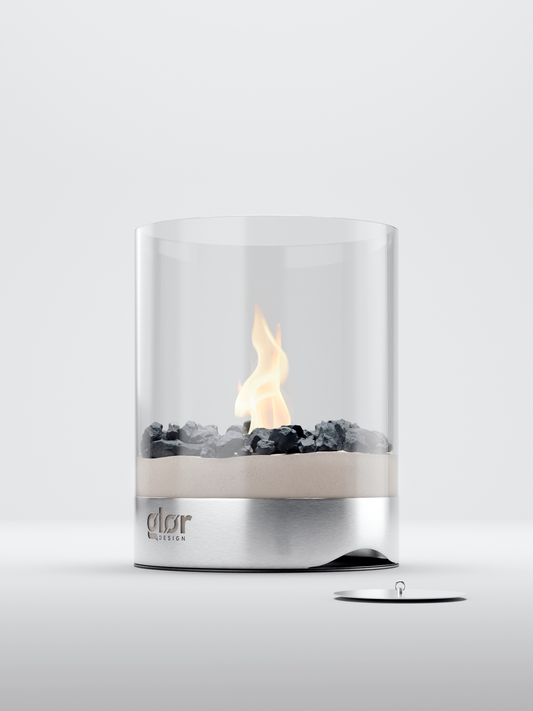 The LA\VIK interior fireplace on a white background with the lid in the foreground.