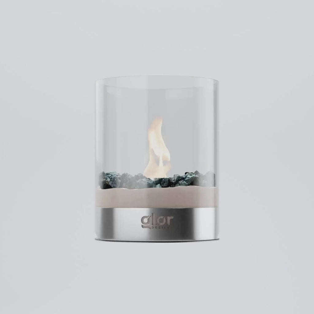 LA\VIK Fireplace - Modern, Portable Bioethanol Fireplace with cylindrical glass design, stainless steel base, and real flame for indoor use.