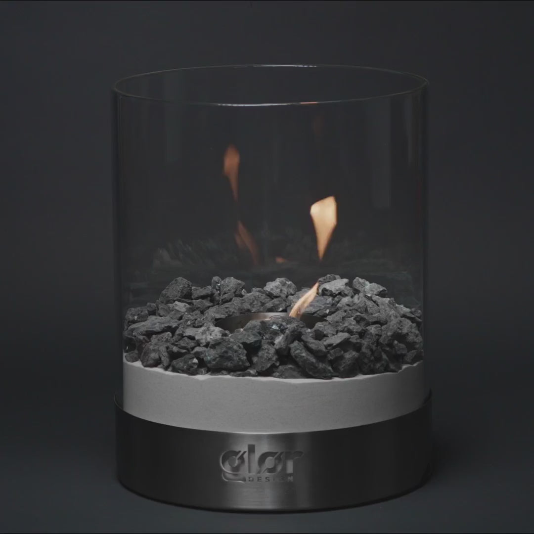 Fragrance Collection (3x) used with a tabletop fireplace featuring Larvikit stones and visible flames for aromatic ambiance.